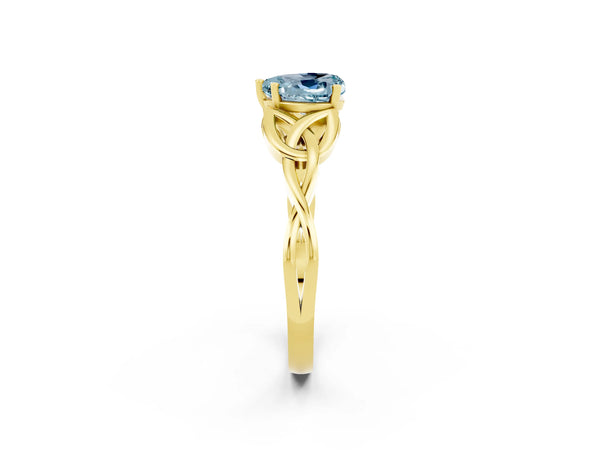 Yellow gold Heart Cut Aquamarine Solitaire Celtic Knot Ring with Four-Prong Setting
