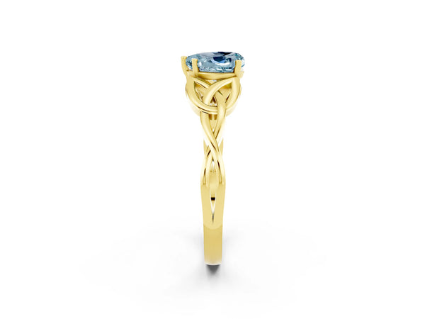 Yellow gold Heart Cut Aquamarine Solitaire Engagement Ring with Celtic Knot Band and Four-Prong Setting