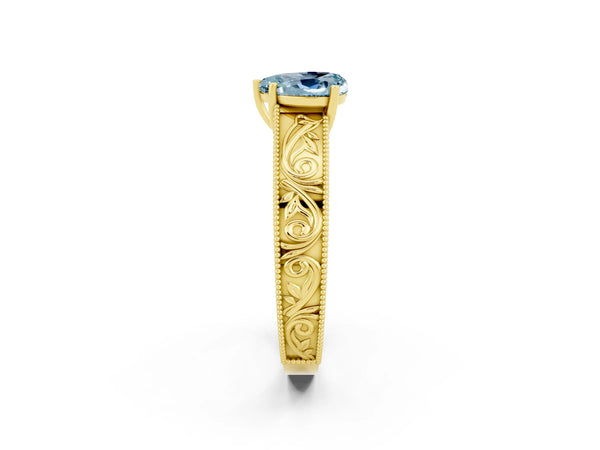 Yellow gold Heart Cut Aquamarine Solitaire Ring with Engraved Band and Four-Prong Setting