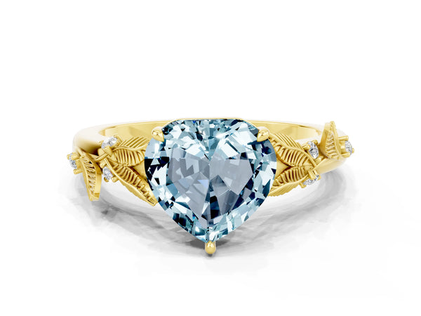 Yellow gold Heart Cut Aquamarine Solitaire Ring with Leaf Motif Band and Four-Prong Setting