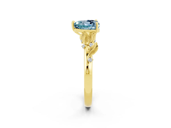 Yellow gold Heart Cut Aquamarine Solitaire Ring with Leaf Motif Band and Four-Prong Setting