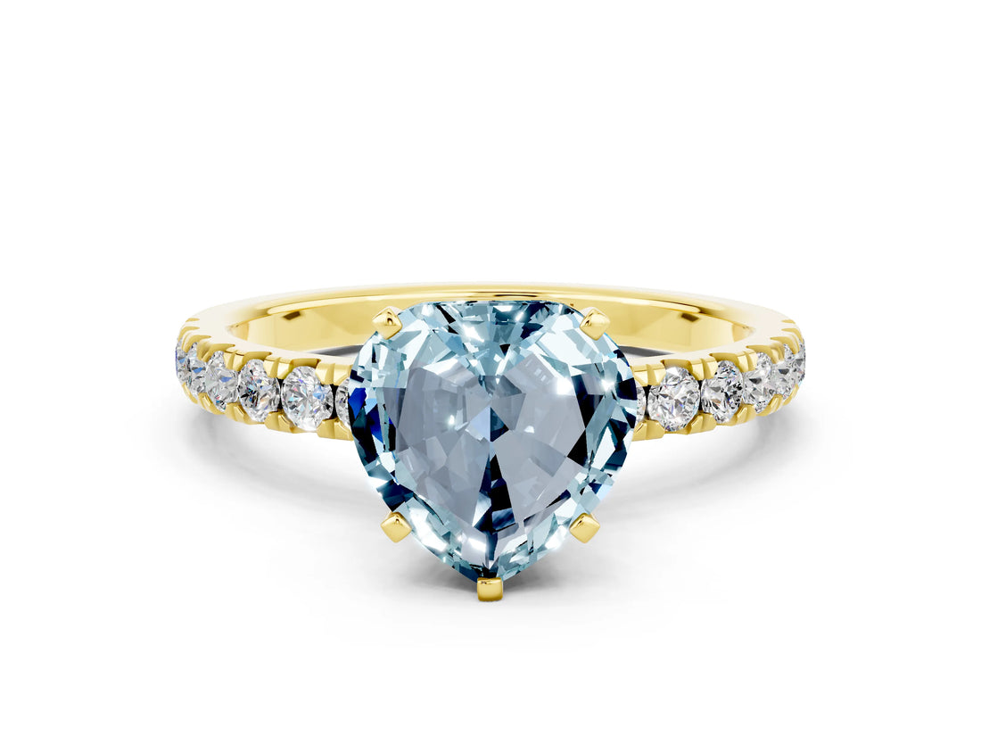 Yellow gold Heart Cut Aquamarine Solitaire Ring with Pavé Accents and Four-Prong Setting