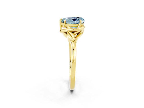 Yellow gold Heart Cut Aquamarine Solitaire Ring with Twist Band and Four-Prong Setting