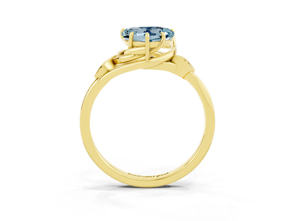 Yellow gold Heart Cut Aquamarine Solitaire Ring with Twist Band and Four-Prong Setting