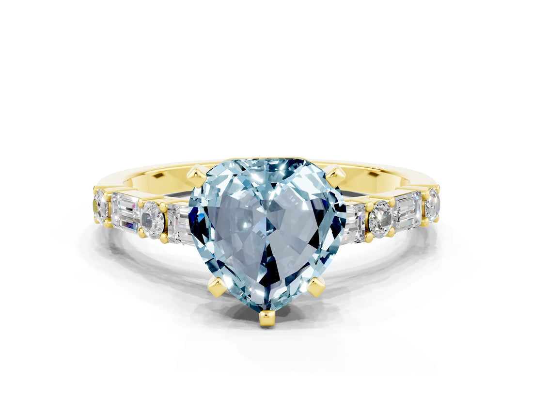 Yellow gold Heart Cut Aquamarine Solitaire with Side Baguettes and Channel Set Band