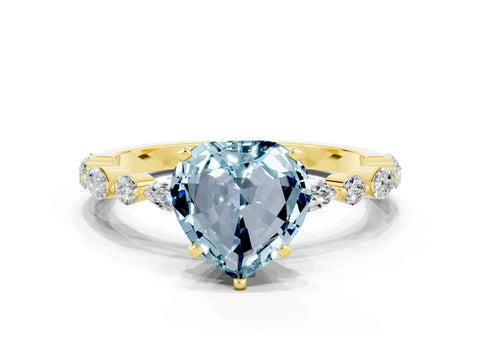 Yellow gold Heart Cut Aquamarine Solitaire with Side Stones on a Pavé Band and Four-Prong Setting
