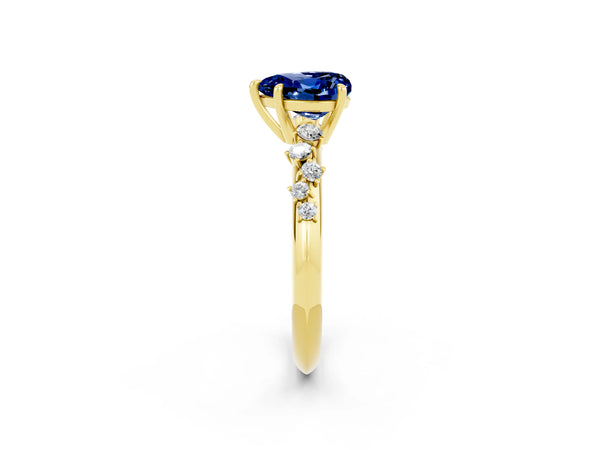 Yellow gold Heart Cut Blue Sapphire Cluster Side Stone Solitaire Ring with Prong Setting