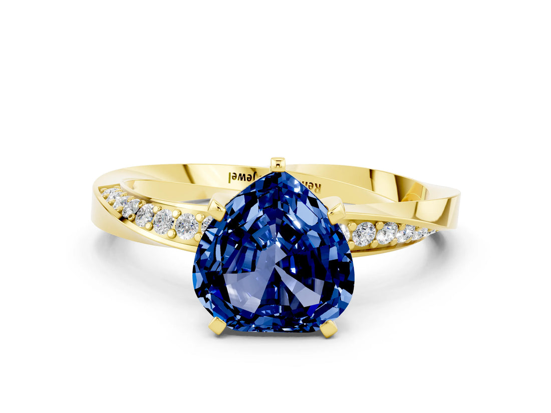 Yellow gold Heart Cut Blue Sapphire Engagement Ring with Side Stone Accents and Four-Prong Setting_60