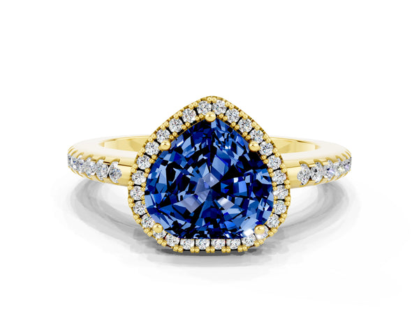 Yellow gold Heart Cut Blue Sapphire Pavé Halo Ring with Four-Prong Setting
