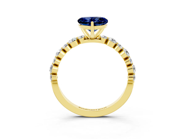 Yellow gold Heart Cut Blue Sapphire Prong Set Engagement Ring with Pavé Band