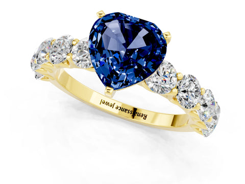 Yellow gold Heart Cut Blue Sapphire Prong Setting with Side Stones on a Pave Band_1