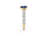 Yellow gold Heart Cut Blue Sapphire Prong Setting with Side Stones on a Pave Band_2