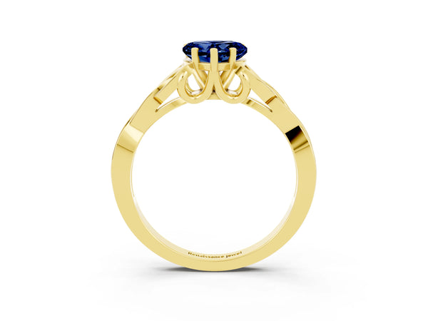 Yellow gold Heart Cut Blue Sapphire Solitaire Celtic Knot Ring with Four-Prong Setting