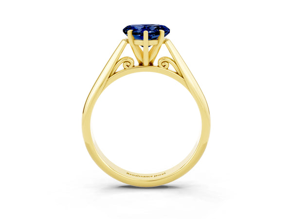 Yellow gold Heart Cut Blue Sapphire Solitaire Engagement Ring with Cathedral Setting and Four-Prong Mount