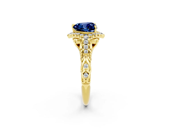 Yellow gold Heart Cut Blue Sapphire Solitaire Ring with Hidden Halo and Pavé Band