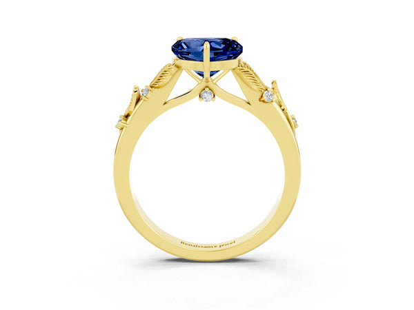 Yellow gold Heart Cut Blue Sapphire Solitaire Ring with Leaf Motif Band and Four-Prong Setting