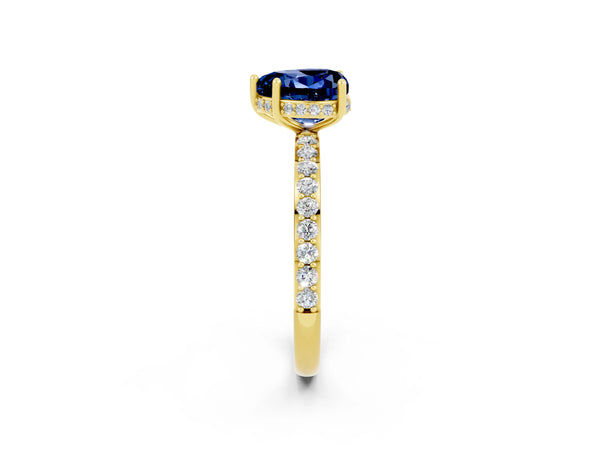 Yellow gold Heart Cut Blue Sapphire Solitaire Ring with Pavé Band and Hidden Halo