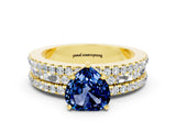 Yellow gold Heart Cut Blue Sapphire Solitaire Ring with Pavé and Channel Set Band