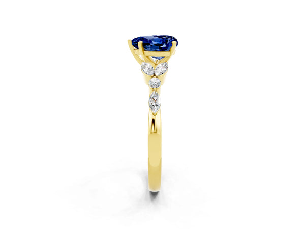 Yellow gold Heart Cut Blue Sapphire Solitaire Ring with Side Stones and Four-Prong Setting