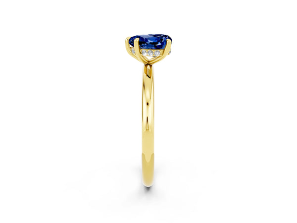 Yellow gold Heart Cut Blue Sapphire Solitaire Ring with Thin Band and Four-Prong Setting