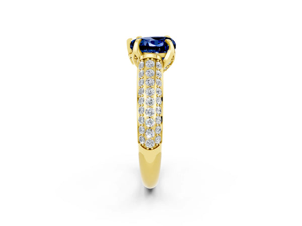 Yellow gold Heart Cut Blue Sapphire Solitaire Ring with Three-Row Pavé Band and Four-Prong Setting