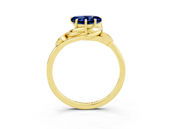 Yellow gold Heart Cut Blue Sapphire Solitaire Ring with Twist Band and Four-Prong Setting