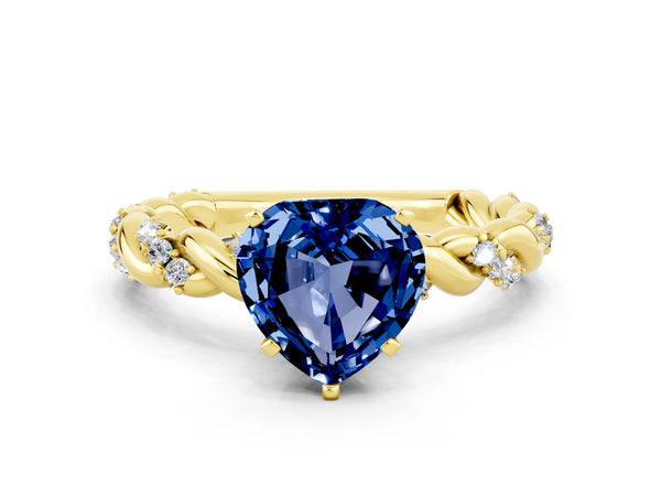 Yellow gold Heart Cut Blue Sapphire Solitaire Ring with Twisted Band and Pavé Accents