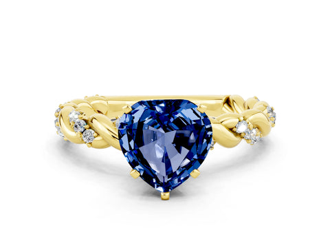 Yellow gold Heart Cut Blue Sapphire Solitaire Ring with Twisted Band and Pavé Accents