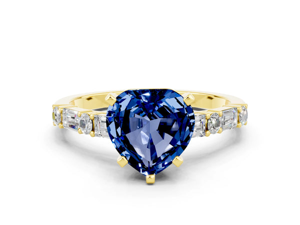 Yellow gold Heart Cut Blue Sapphire Solitaire with Side Baguettes and Channel Set Band