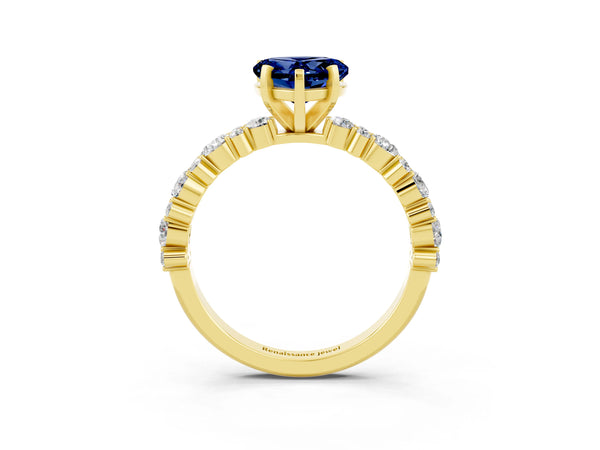 Yellow gold Heart Cut Blue Sapphire Side Stone Solitaire Ring with Round  and Four-Prong Setting