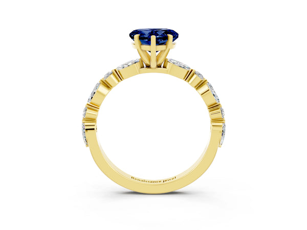 Yellow gold Heart Cut Blue Sapphire Ring with Marquise and Round  Side Stones and Four-Prong Setting