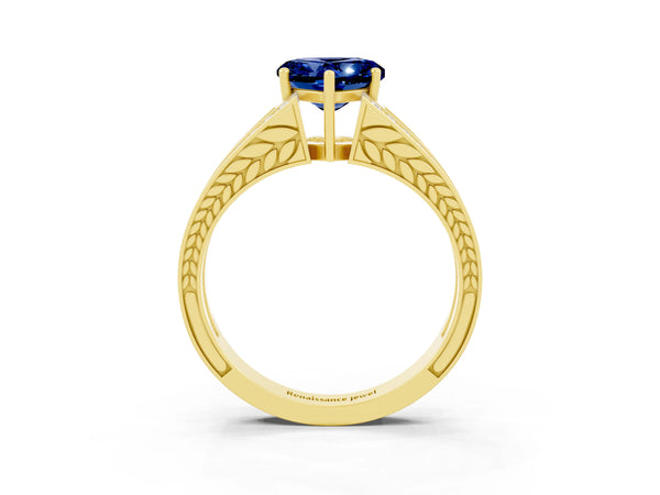 Yellow gold Heart Cut Blue Sapphire Split Shank Ring with Pavé Band and Four-Prong Setting