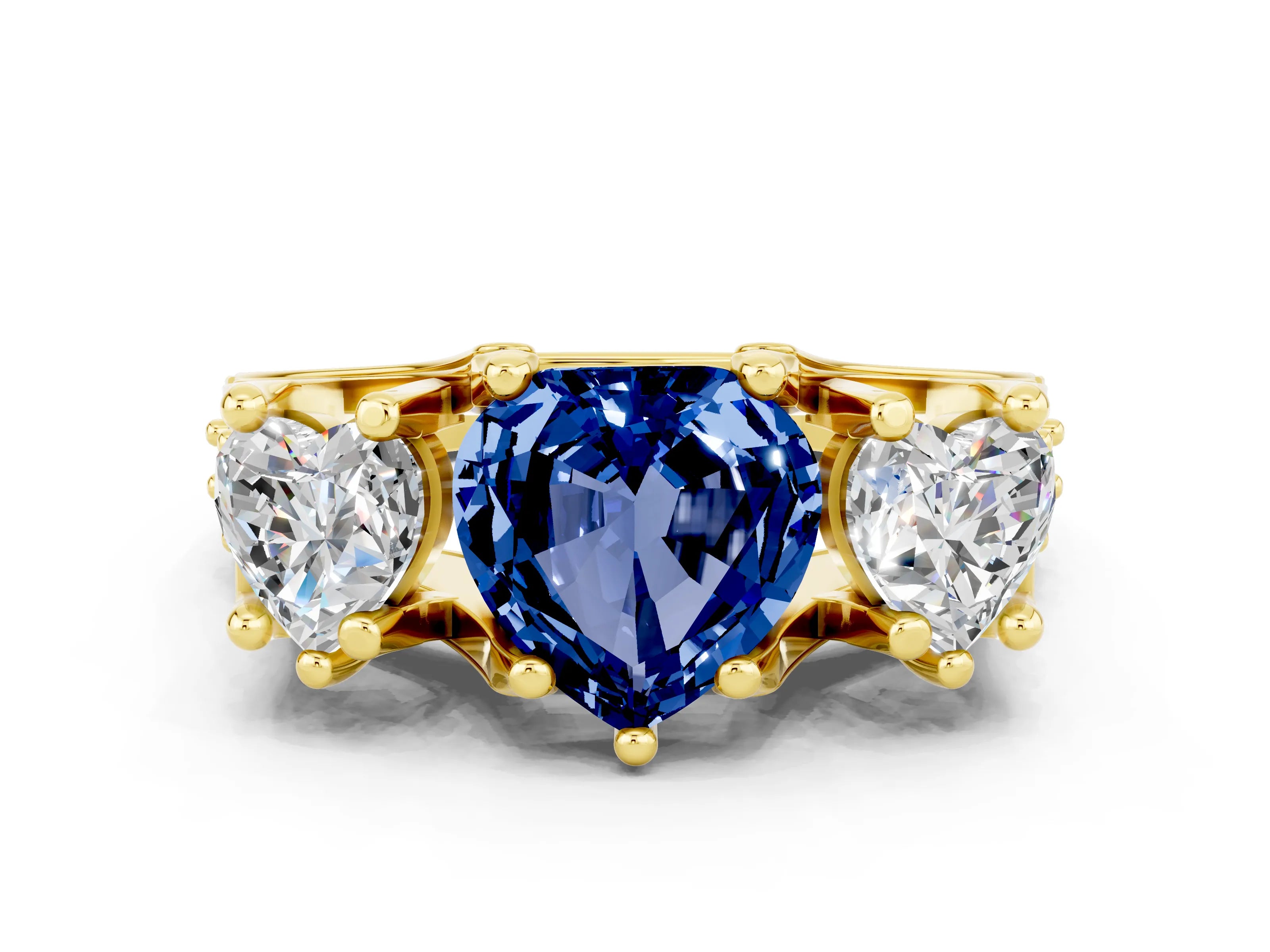 Yellow gold Heart Cut Blue Sapphire Three-Stone Ring with Channel Set Band and Four-Prong Setting