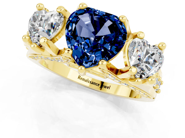Yellow gold Heart Cut Blue Sapphire Three-Stone Ring with Channel Set Band and Four-Prong Setting