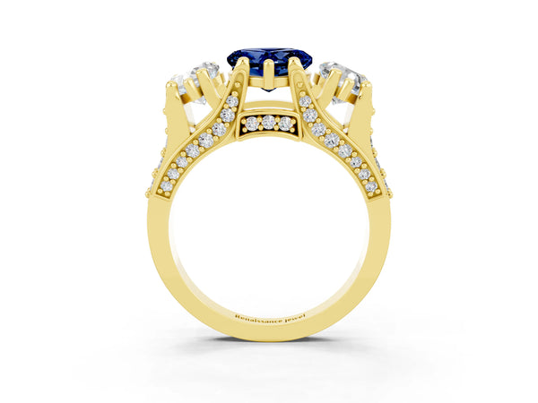 Yellow gold Heart Cut Blue Sapphire Three-Stone Ring with Channel Set Band and Four-Prong Setting