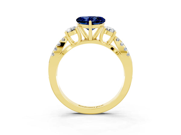 Yellow gold Heart Cut Blue Sapphire Three-Stone Ring with Pavé Split Shank and Four-Prong Setting