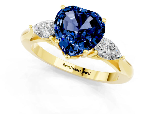 Yellow gold Heart Cut Blue Sapphire Three-Stone Ring with Pear  Side Stones and Prong Setting