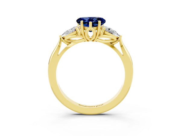 Yellow gold Heart Cut Blue Sapphire Three-Stone Ring with Pear  Side Stones and Prong Setting