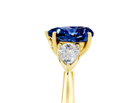 Yellow gold Heart Cut Blue Sapphire Three-Stone Ring with Pear Side Stones and Four-Prong Setting_17