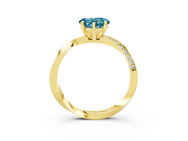 Yellow gold Heart Cut Blue Topaz Engagement Ring with Side Stone Accents and Four-Prong Setting