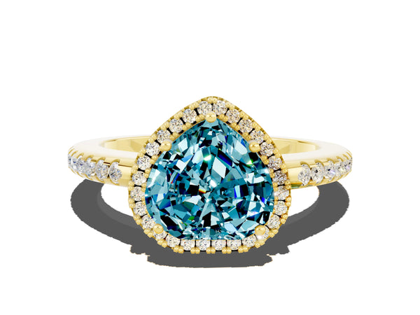 Yellow gold Heart Cut Blue Topaz Pavé Halo Ring with Four-Prong Setting