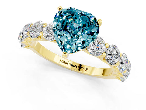 Yellow gold Heart Cut Blue Topaz Prong Setting with Side Stones on a Pave Band_1