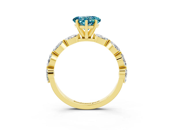 Yellow gold Heart Cut Blue Topaz Ring with Marquise Side Stones and Prong Setting