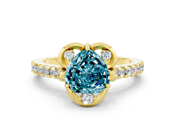 Yellow gold Heart Cut Blue Topaz Ring with Pavé Band and Floral Prong Setting