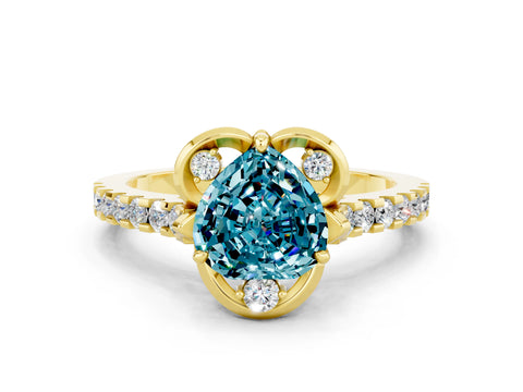 Yellow gold Heart Cut Blue Topaz Ring with Pavé Band and Floral Prong Setting