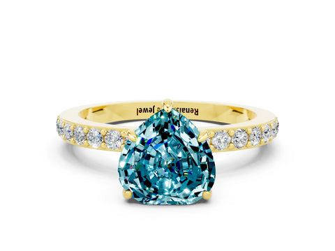Yellow gold Heart Cut Blue Topaz Ring with Pavé Band and Four-Prong Setting