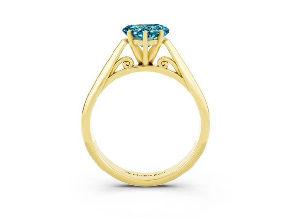 Yellow gold Heart Cut Blue Topaz Solitaire Engagement Ring with Cathedral Setting and Four-Prong Mount