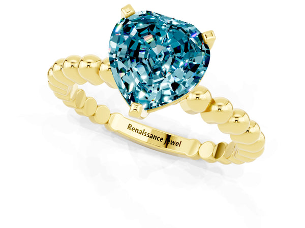 Yellow gold Heart Cut Blue Topaz Solitaire Ring with Beaded Band and Prong Setting