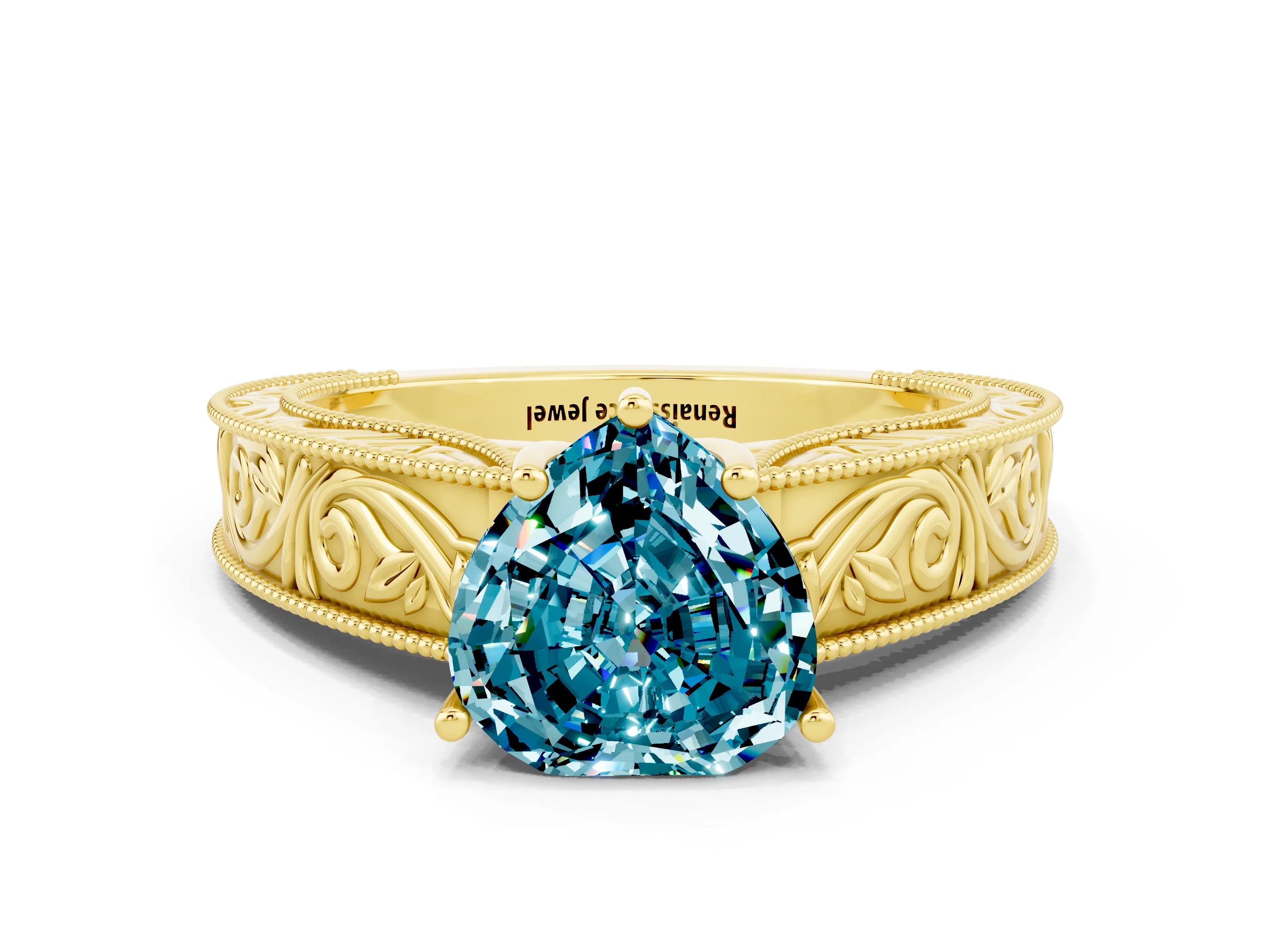 Yellow gold Heart Cut Blue Topaz Solitaire Ring with Engraved Band and Four-Prong Setting