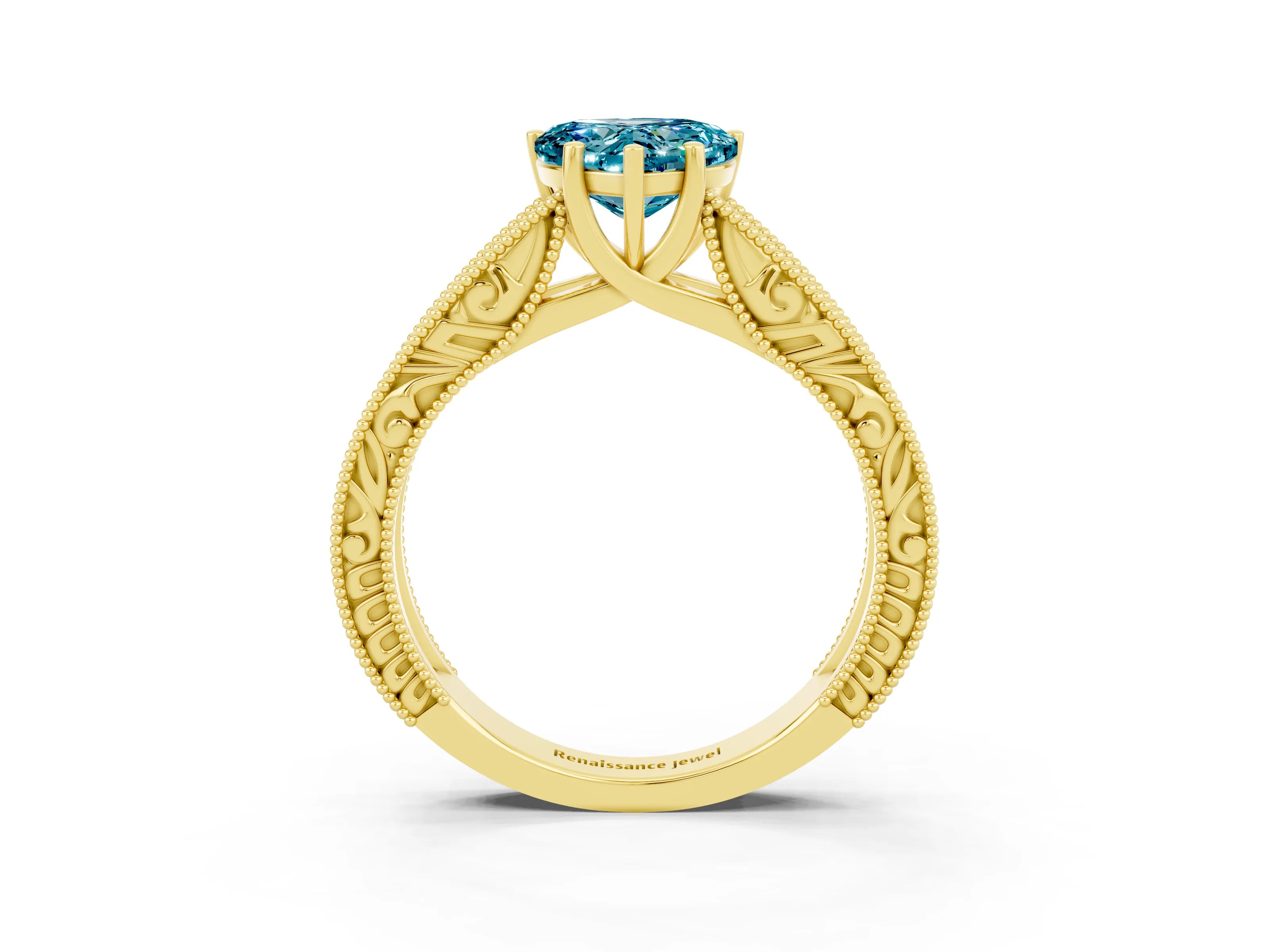 Yellow gold Heart Cut Blue Topaz Solitaire Ring with Engraved Band and Four-Prong Setting_3